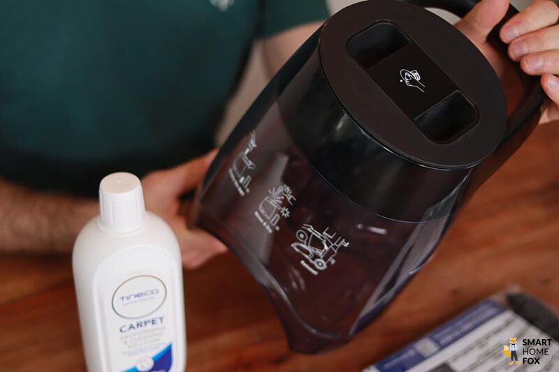 The size of the carpet cleaner tank is shown.